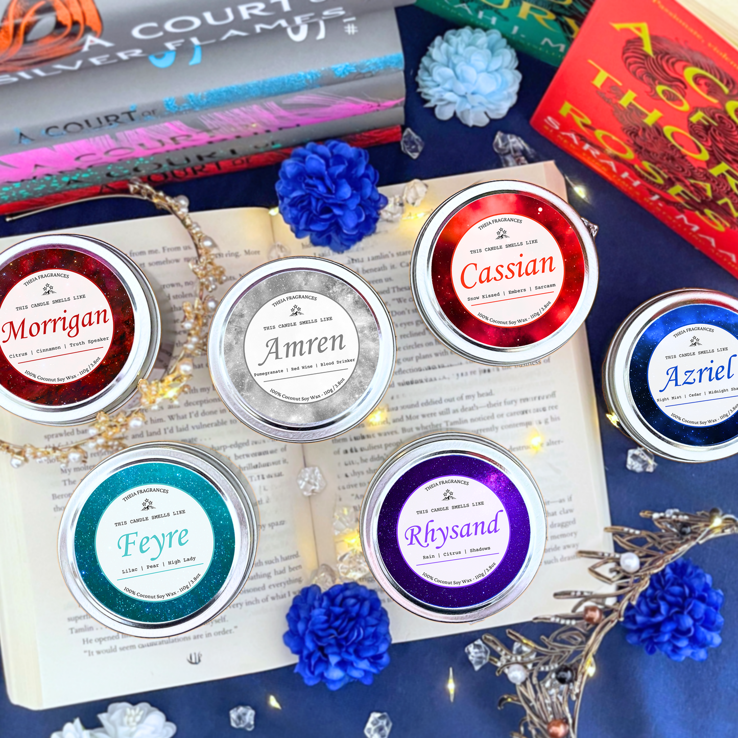 The 'Inner Circle Bundle' made of coconut soy wax by Theia Fragrances provides two sizes - a 215G glass jar with a black lid and a 110G round tin. They are styled on an open book with decorative crystals and a colorful bookshelf background.