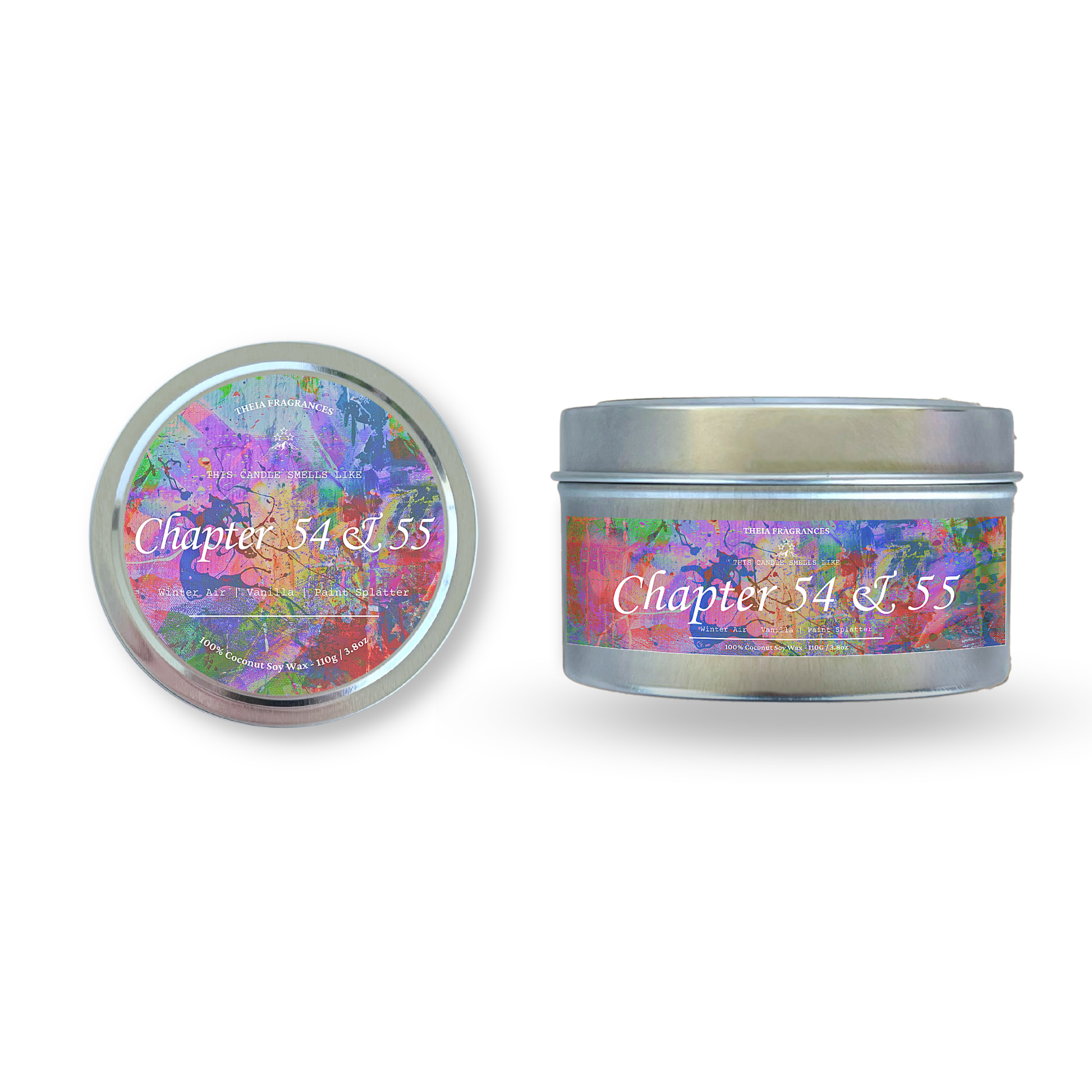 The 'Chapter 54 & 55' coconut soy wax candle by Theia Fragrances is demonstrated in the 110G tin candle. The label features a paint splattered background. It is styled on an open book with decorative crystals and flowers.